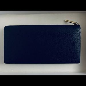 3.1 Phillip Lim - travel wallet